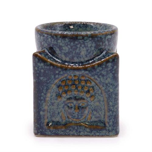 Buddha brænder til æterisk olie i dusty blue